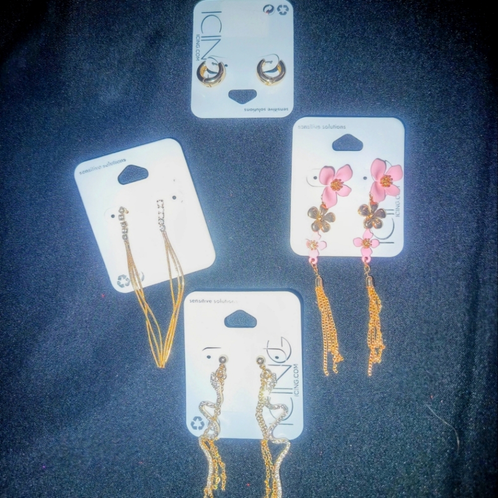 4 pair of gold tone earrings